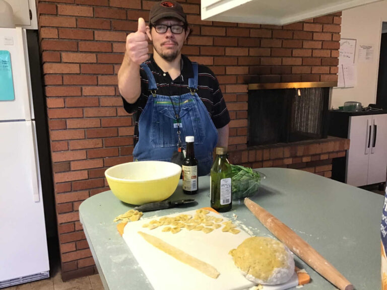 Resident making pasta